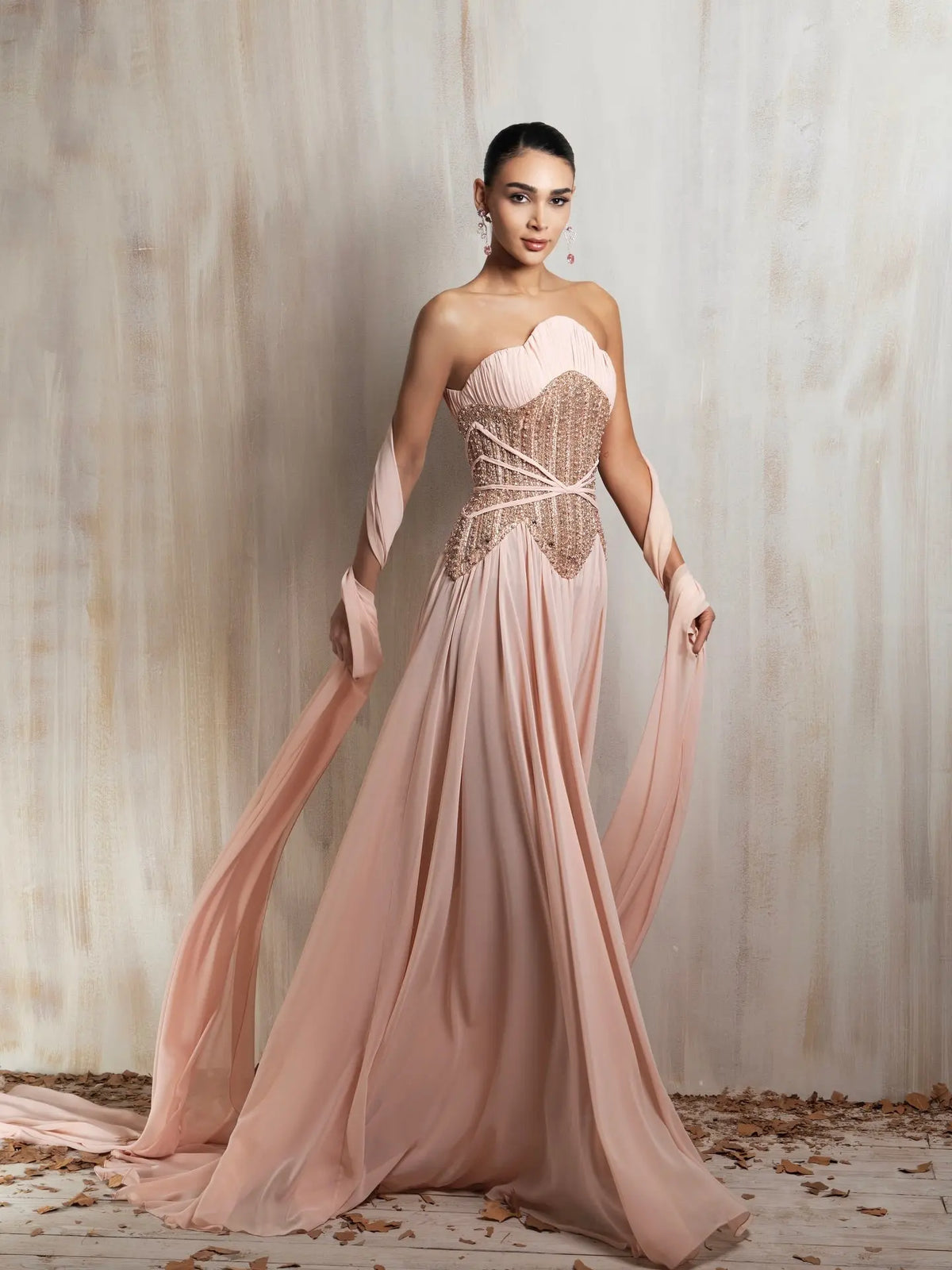 rhinestone formal dress Mermaid Sequin Strapless Model is wearing Stone color. KissProm Black Rhinestone One Shoulder